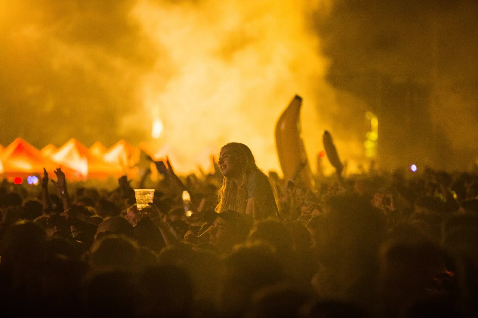 Golden haze over the FIB crowd with an inflatable banana in the air
