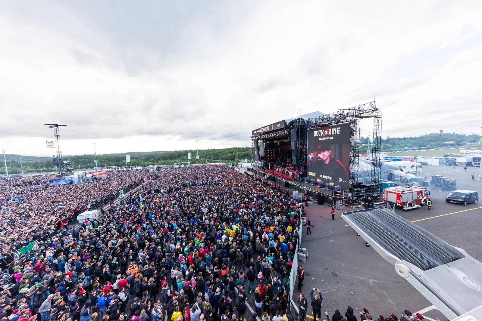 The Volcano Stage at Rock am Ring with a huge crowd filling the Nurburgring infield
