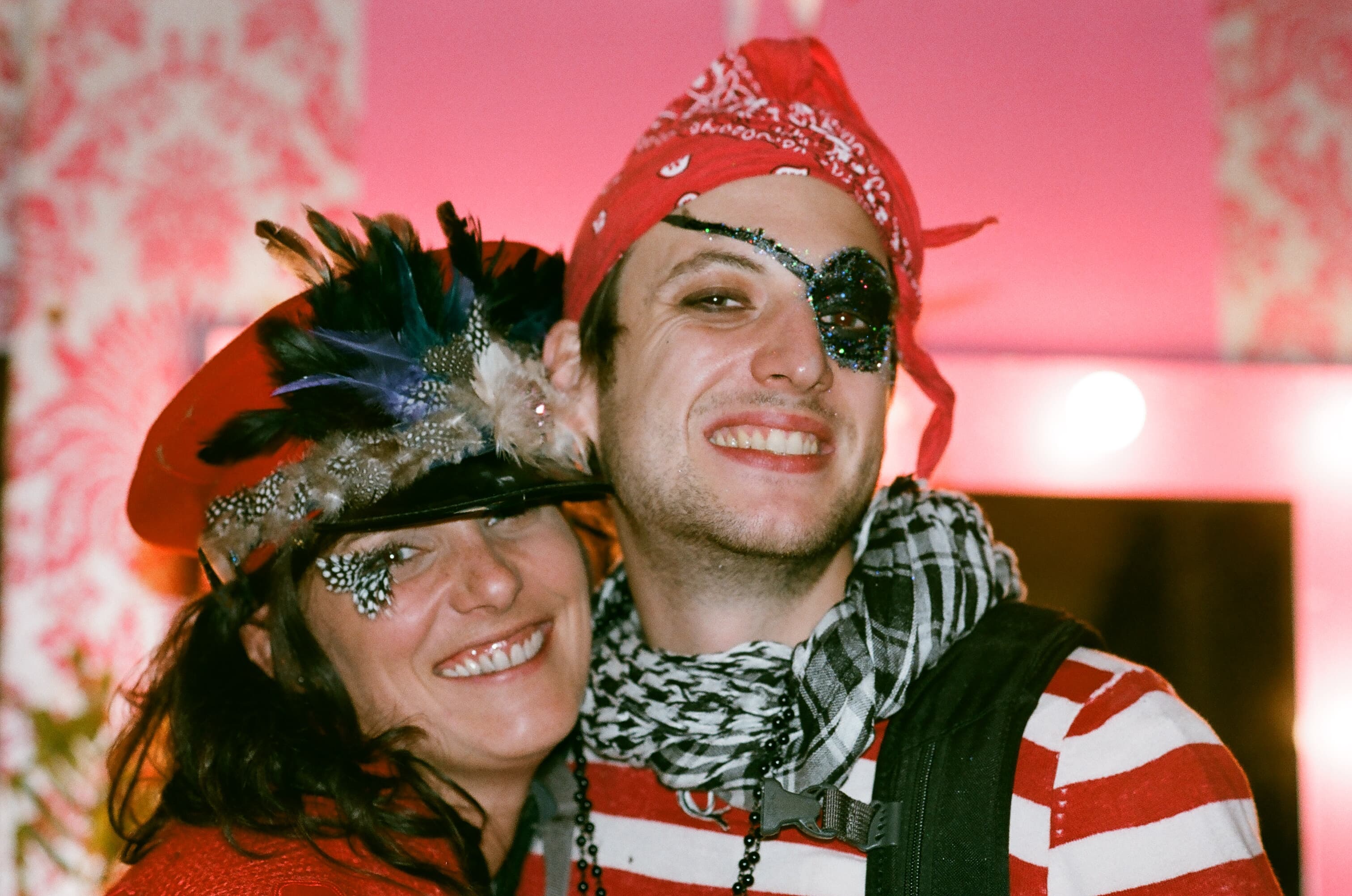 Costumed festivalgoers smiling at Shambala Festival